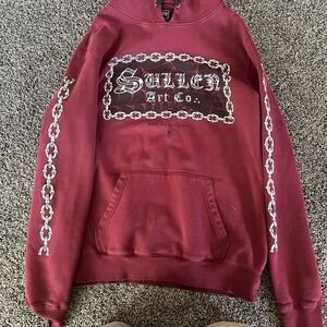 Sullen large sweater.